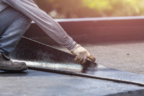 Professional Basement Waterproofing technician working in Kane, PA